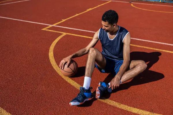 Handsome Basketball Player Sitting Outdoor Summer Court Stock Photo