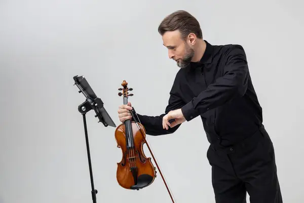 Handsome Man Holding Violin His Hands Playing Classic Music Isolated Stockfoto