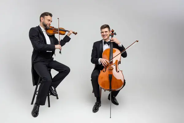 Guys Musicians Playing Contrabass Violin Isolated White Background lizenzfreie Stockbilder