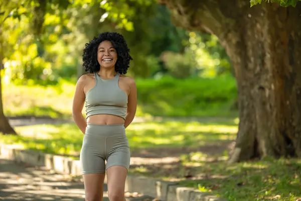 stock image Excited and happy. Cute woman in summer sportswear looking excited and happy