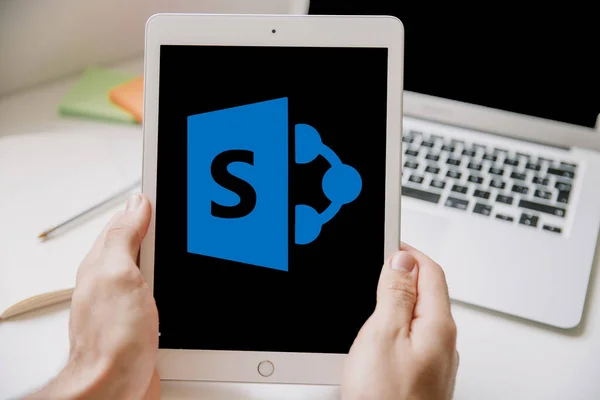 stock image SharePoint allows users to create, manage, and share information and documents within an organization