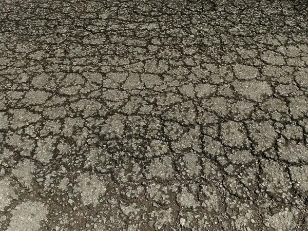 çatlak ve çiziklerle asfalt arkaplan