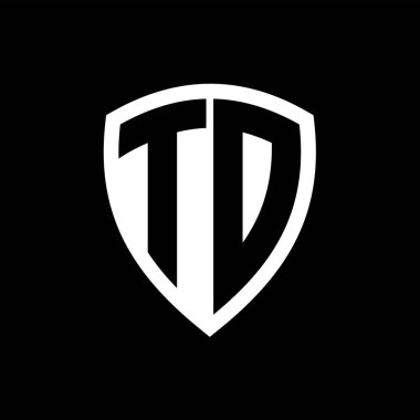 Siyah ve beyaz renk desenli kalın harfli TD monogram logosu.