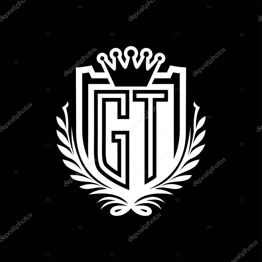 GT Letter logo heraldic shield shape with crown, vintage shield on black background template design