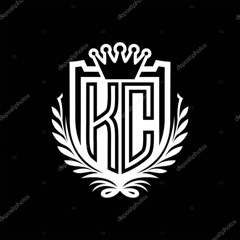 KC Letter logo heraldic shield shape with crown, vintage shield on black background template design