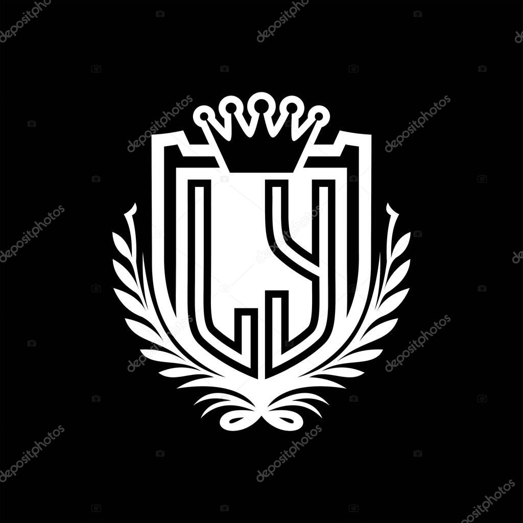 LY Letter logo heraldic shield shape with crown, vintage shield on black background template design
