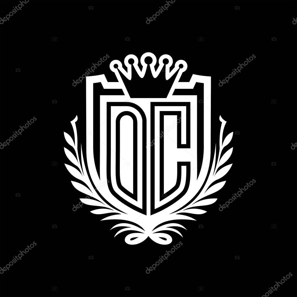 OC Letter logo heraldic shield shape with crown, vintage shield on black background template design