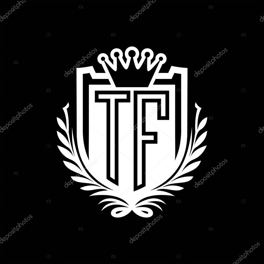 TF Letter logo heraldic shield shape with crown, vintage shield on black background template design