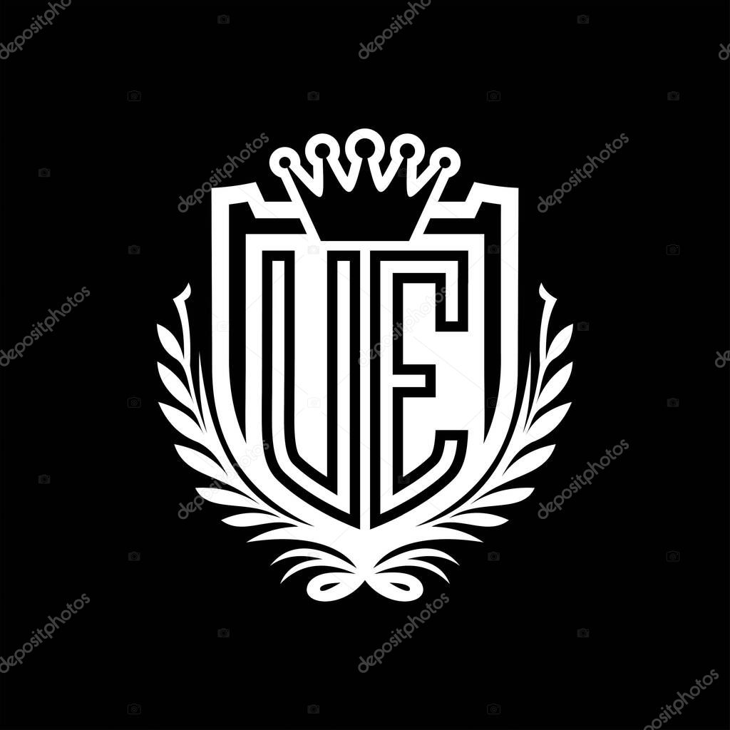 UE Letter logo heraldic shield shape with crown, vintage shield on black background template design