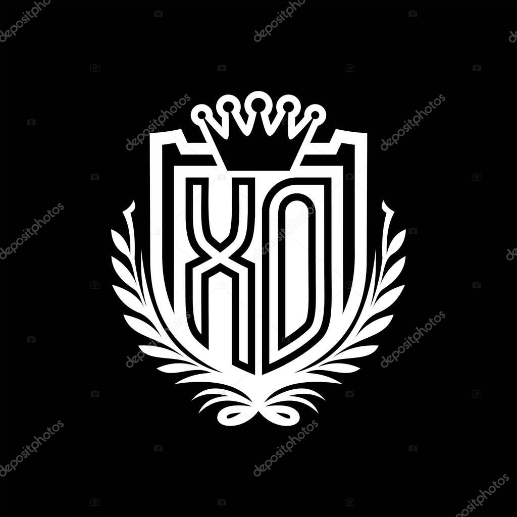 XO Letter logo heraldic shield shape with crown, vintage shield on black background template design