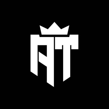 Sivri uçlu ve kalın yazı tipi olan keskin geometrik tarzda bir kalkanın AT logo vektör görüntüsü