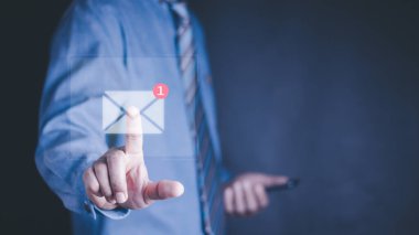 business people touch on email in virtual screen. internet technology.New email notification concept for business e-mail communication and digital marketing. Inbox receiving electronic message alert.