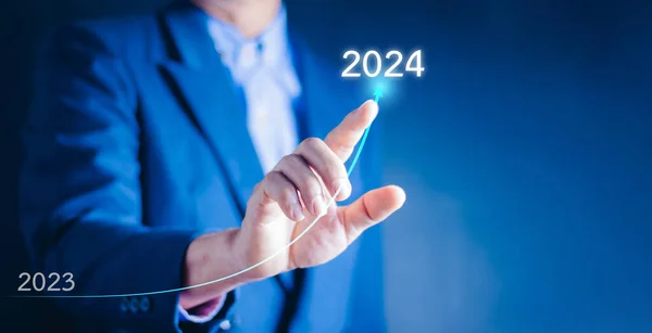 Business target and goals trends 2024. Analytical businessperson planning business growth 2024, strategy digital marketing, profit income, economy, start up business, technical analysis strategy