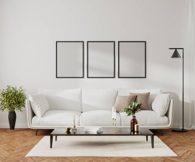 Poster çerçevesi modern ev oturma odasının içini beyaz kanepe ve dekorlu kahve masası ile süslemiş.