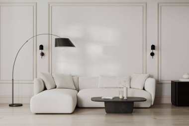 Beyaz duvarlı modern oturma odası ve ahşap zeminli kanepe.