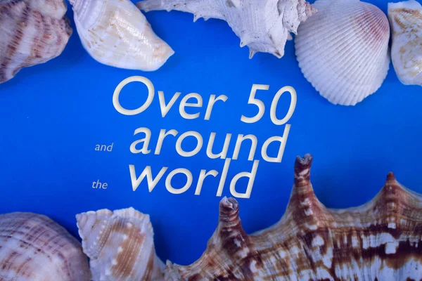 Animal Shell, Summer vacation, marine background with Over 50 and around the world text.