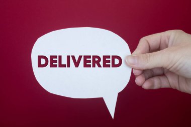 Speech bubble in front of colored background with Delivered text.