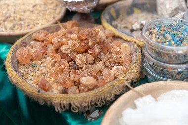 Frankincense, incense, aromatic herbs and spices on street market in Petra (Red Rose City), Jordan clipart