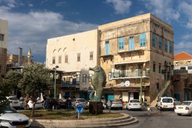 Acre, North District, Israel - January 12, 2023: Seahorse Statue in the Old City of Akko during a cloudy day.