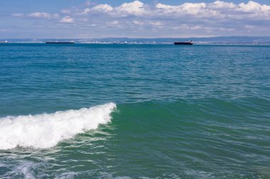 Mediterranean Sea, view from the port of Haifa to the ships waiting in line to enter the port.