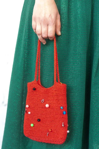 Red Purse Bag Knitted Rhinestones Female Hands Background Green Dress — Stock Photo, Image