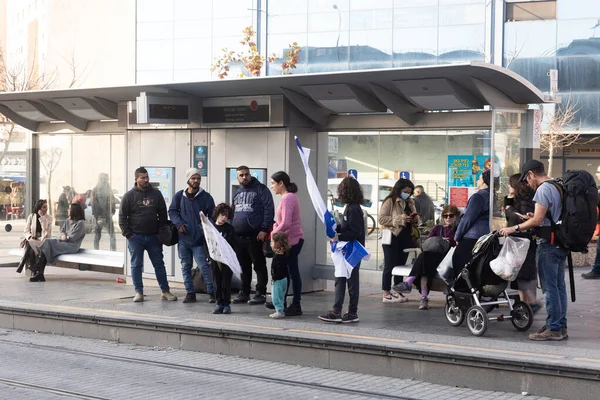 stock image Jerusalem, Israel - March 21 2023: Light Rail tram (train) stop with locals and tourists and Central bus station on Jaffa street. Jerusalem is the most visited city by tourists in Israel