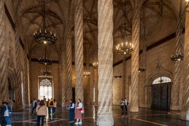 Valencia, Spain - 20 April 2024. The interior of the Silk Exchange with twisted columns - The Lonja de la Seda or Llotja de la Seda is a late Valencian Gothic-style civil building. clipart