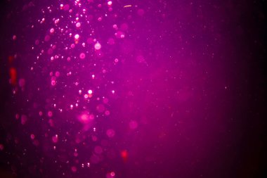 Abstract pink defocus bokeh glitter  with black background
