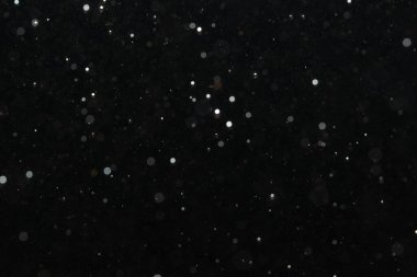 Kutlama arka planı için Bokeh 'in ışıldayan yıldızları