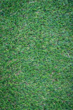 Yeşil yapay çim zemin arka planı