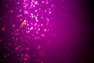 Abstract pink defocus bokeh glitter  with black background