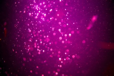 Abstract pink defocus bokeh glitter  with black background
