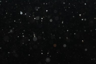 Kutlama arka planı için Bokeh 'in ışıldayan yıldızları