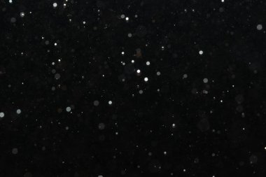 Kutlama arka planı için Bokeh 'in ışıldayan yıldızları