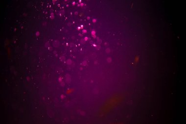 Abstract pink defocus bokeh glitter  with black background