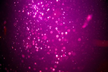 Abstract pink defocus bokeh glitter  with black background