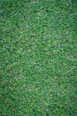 Yeşil yapay çim zemin arka planı