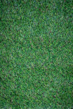Yeşil yapay çim zemin arka planı