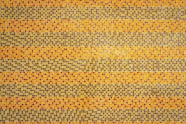 Orange patterned mosaic wall background