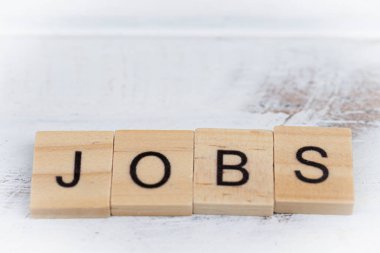 Jobs wooden letters on wood vintage background