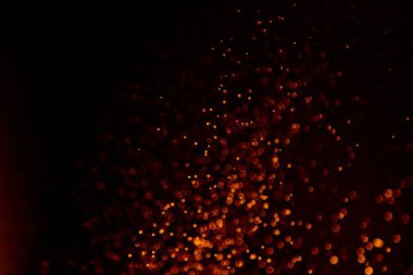 Siyah arkaplan ile güzel soyut kırmızı bokeh