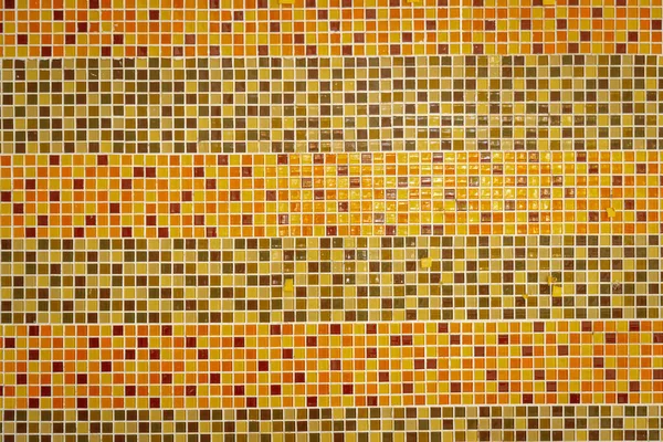 Orange patterned mosaic wall background