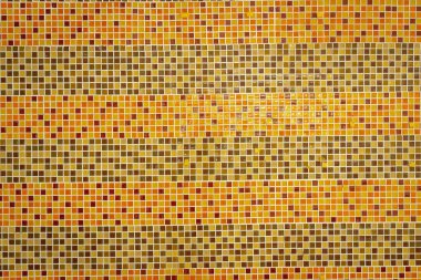 Orange patterned mosaic wall background