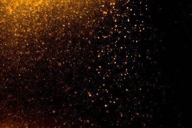 Arkaplanı kutlamak için bulanık altın bokeh yıldızlarını kullan