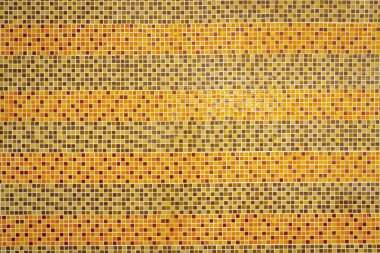 Orange patterned mosaic wall background