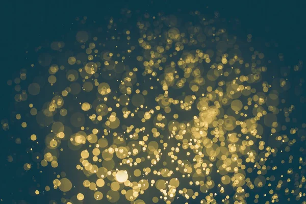stock image Abstract gold bokeh with black background