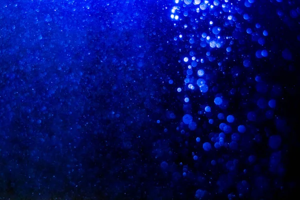 Blue Bokeh Lights Black Background — Stok Foto