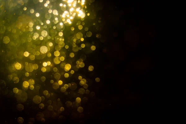 Stock image Glittering stars of blur gold  bokeh use for celebrate background