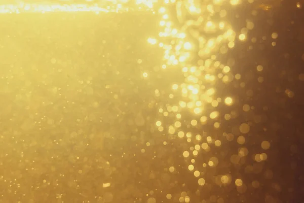 Stock image Glittering stars of blur gold  bokeh use for celebrate background