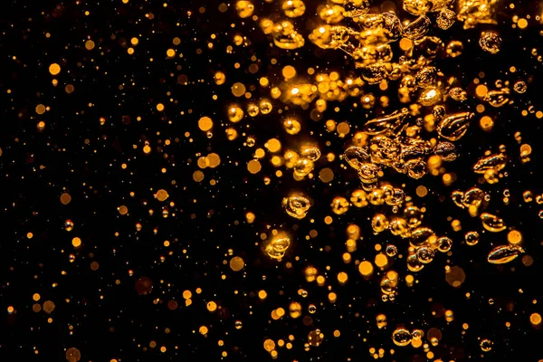 Gold Bokeh Aus Licht Wasser Mit Schwarzem Hintergrund — Stockfoto